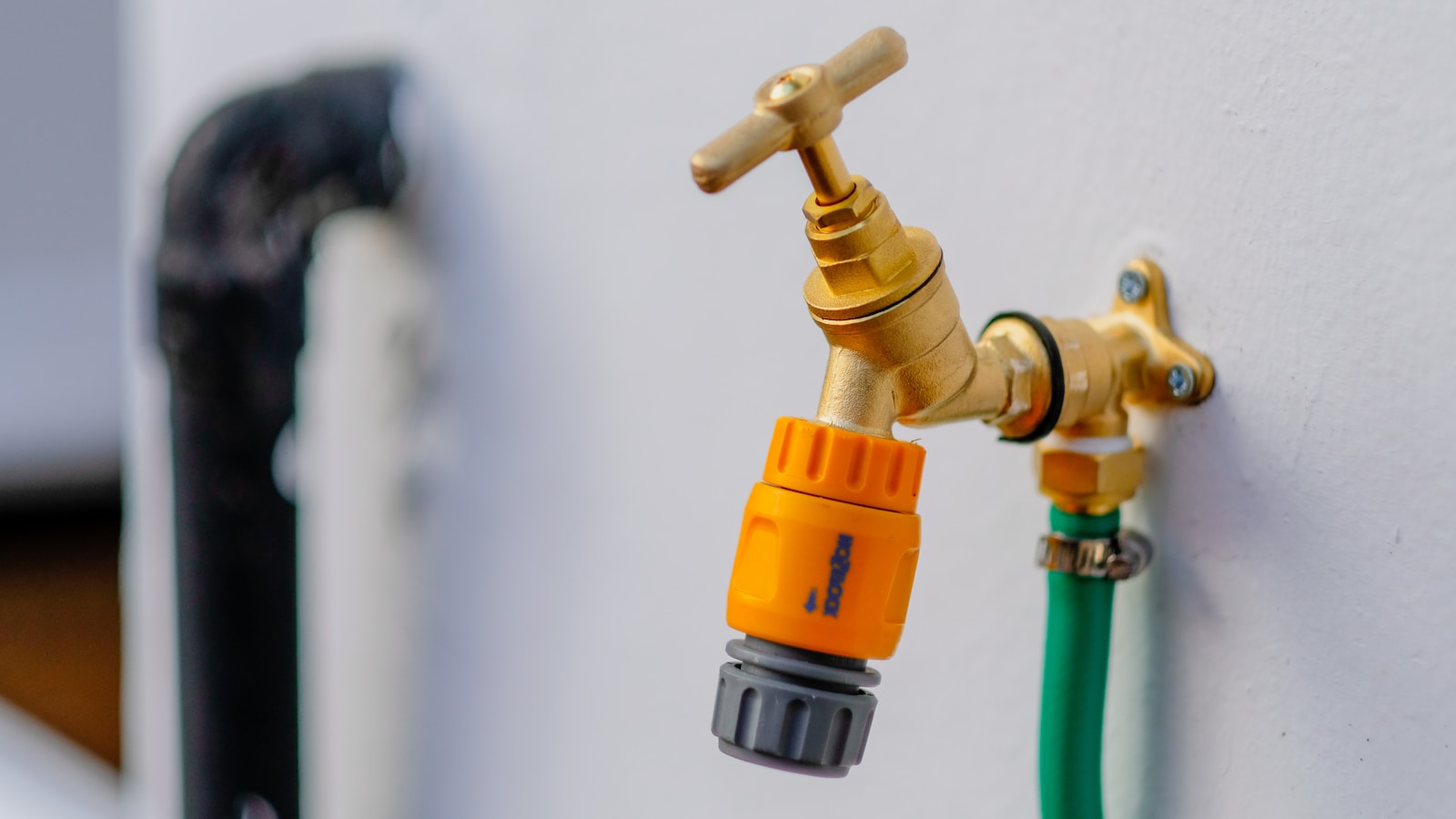 brass-colored faucet covered by homeowners insurance